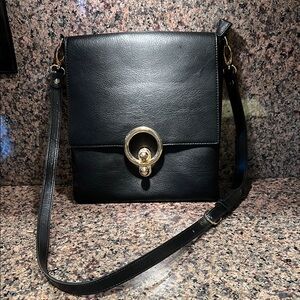 Black Crossbody Bag with Gold Circular Hardware